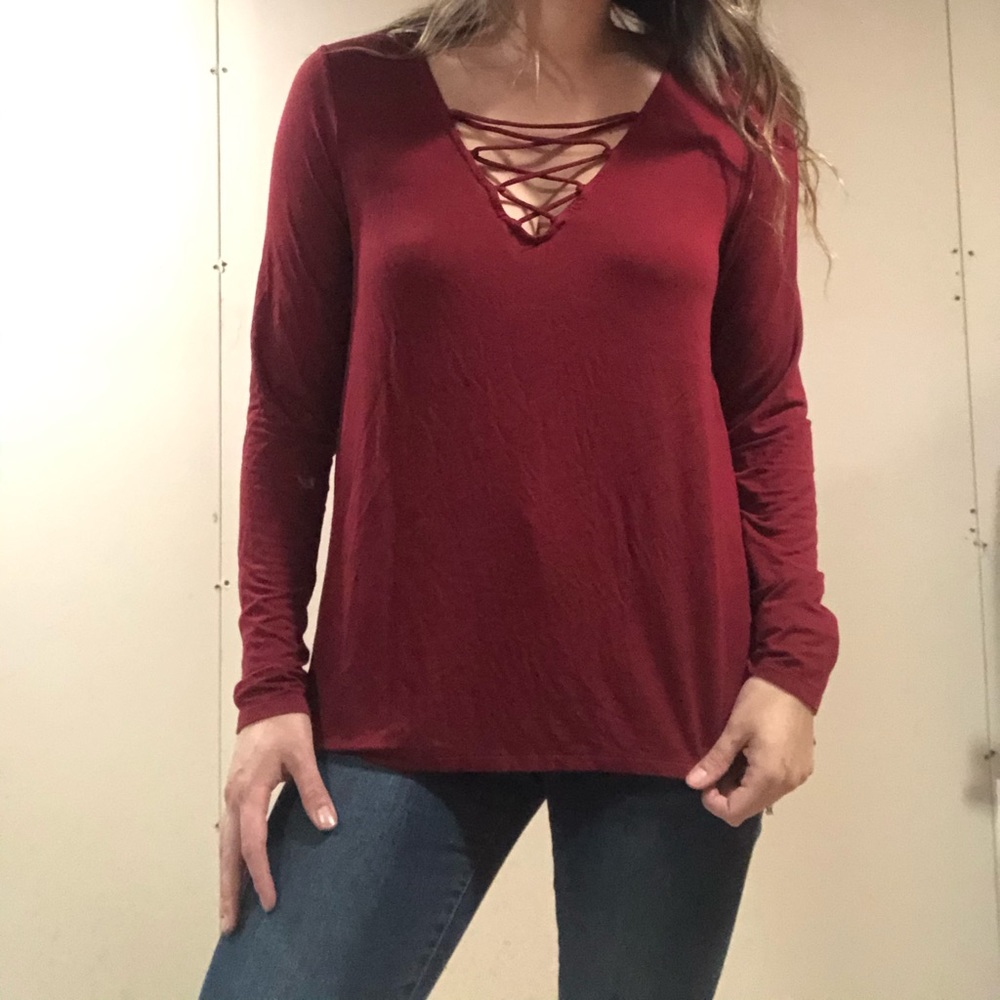 Red, flowy long sleeve v neck tee